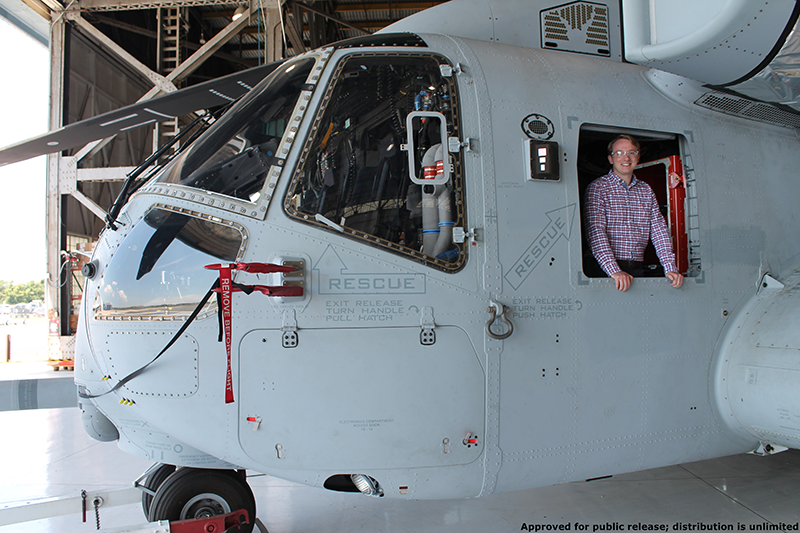 Lauer leans out of the CH53K King Stallion helicopter he is currently working on at Sikorsky Aircraft. 