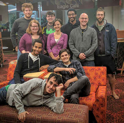 Ryan Theurer and the Unacceptable Risks team pose with their faculty advisor, Julie Hoover, before getting to work on their High Altitude Student Platform project in 2016.