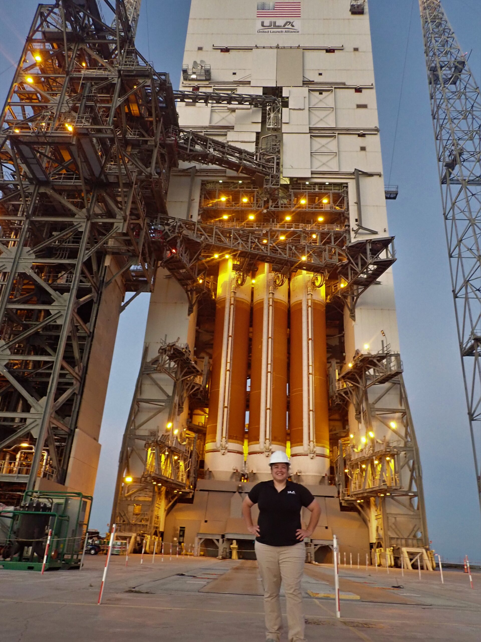 Adams visits the enormous Delta IV Heavy rocket on Space Launch Complex-37 during a recent trip to Cape Canaveral Air Force Station.