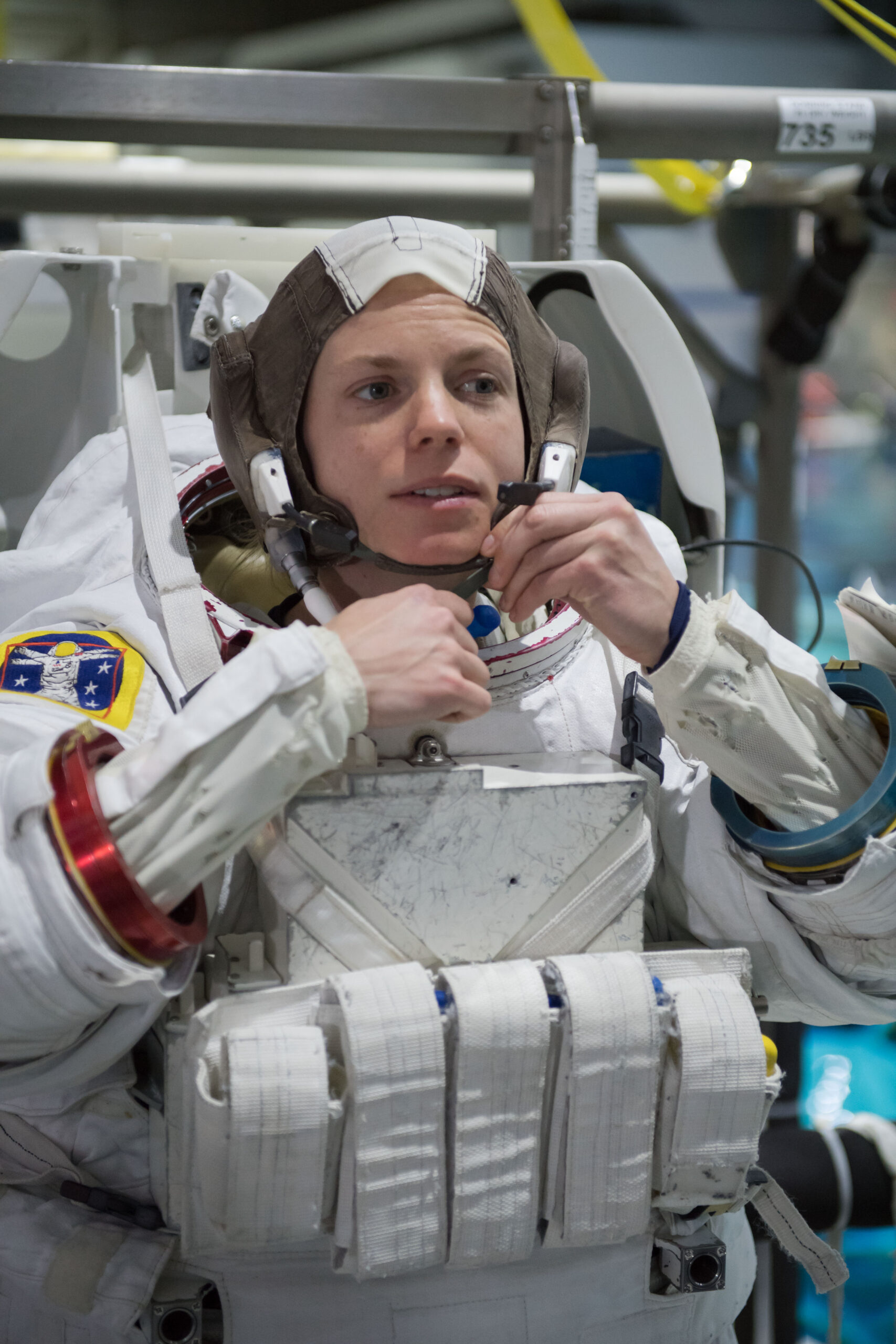 Zena Cardman adjusts her space suit during training.