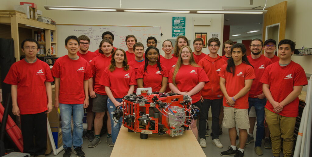 Team members and robot