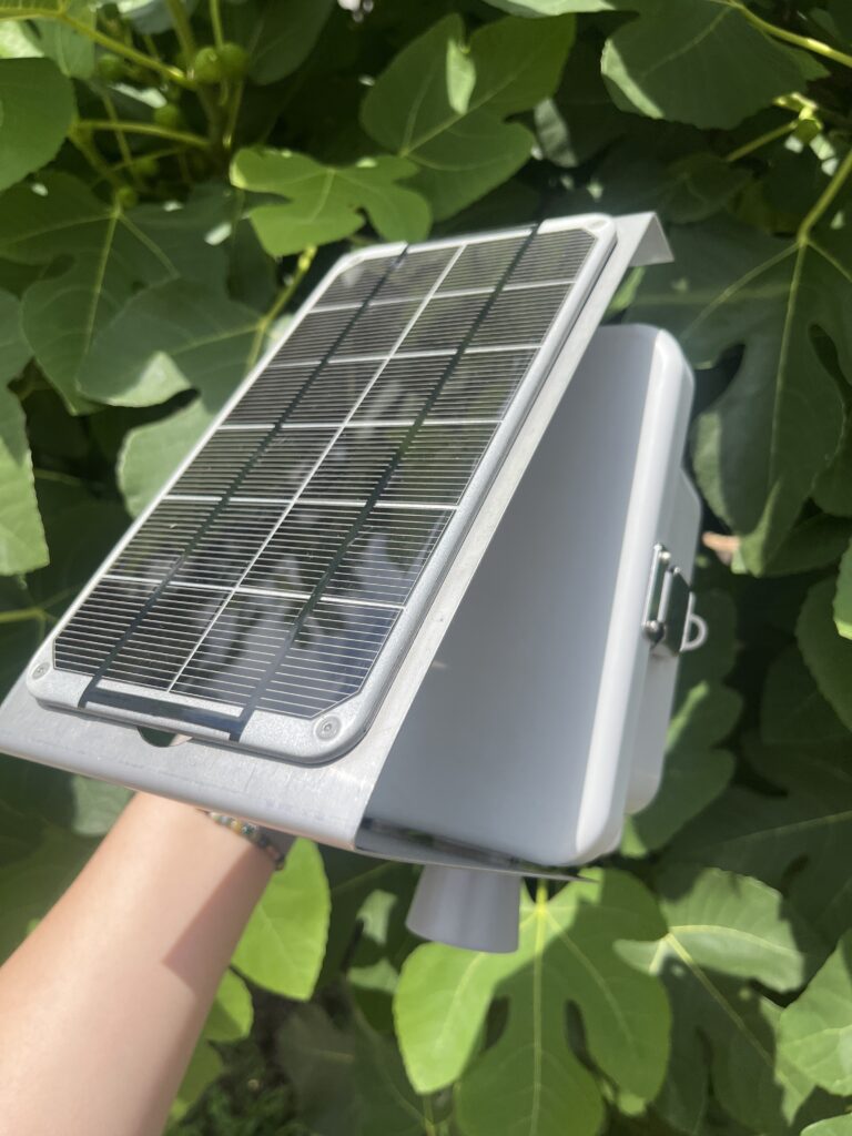 The outside of a sensor node, with gray solar panels
