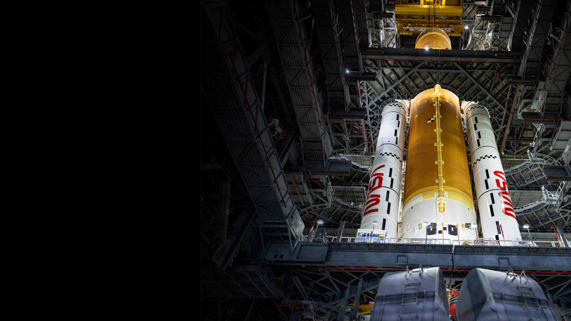 NASA technicians joined the Space Launch System (SLS) core stage with the stacked solid rocket boosters for NASA's Artemis 2 moon mission at the Kennedy Space Center in Florida. (Image credit: NASA/Frank Michaux)